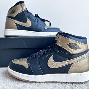 Nike Jordan AJ 1 Mid. Gold and Black.